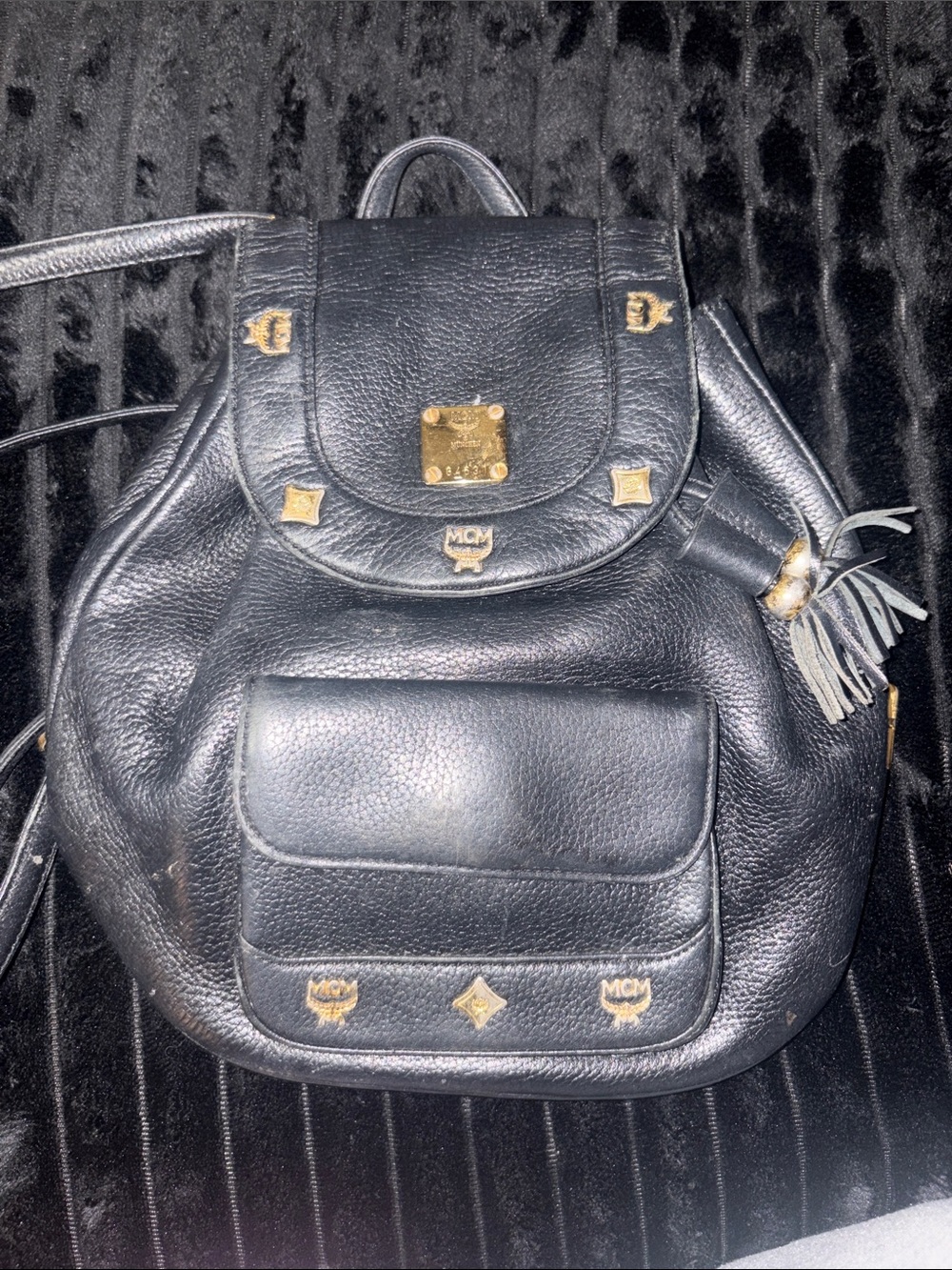 MCM Black Leather Drawstring Backpack with Gold Hardware